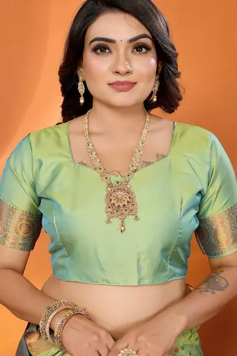 Light green silk blend copper zari weaving banarasi saree with contrast blouse