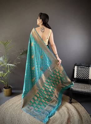 Teal green silk blend copper zari weaving banarasi saree with contrast blouse 3