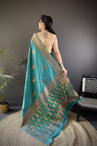Teal green silk blend copper zari weaving banarasi saree with contrast blouse