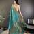 Teal green silk blend copper zari weaving banarasi saree with contrast blouse