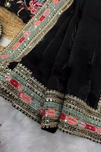 black sequins and embroidery work border silk blend saree
