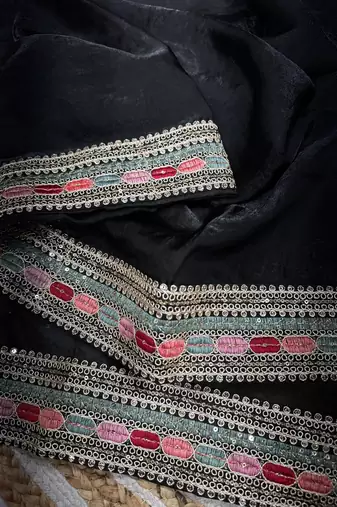 black sequins and embroidery work border silk blend saree