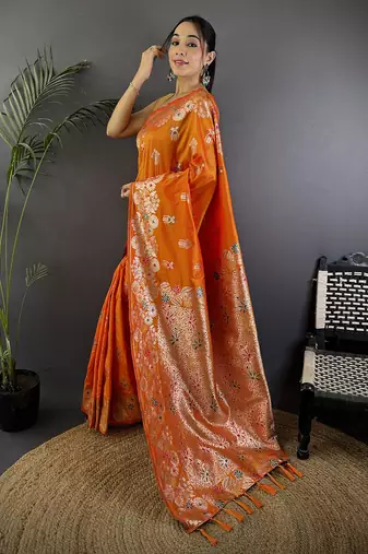 Orange silk blend floral zari weaving meenakari saree with floral border