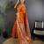 Orange silk blend floral zari weaving meenakari saree with floral border