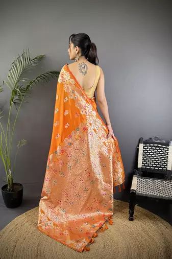 Orange silk blend floral zari weaving meenakari saree with floral border