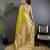 Lime green silk blend floral zari weaving meenakari saree with floral border