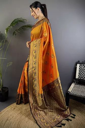 Orange silk blend floral butta zari weaving banarasi with peacock zari weaving border