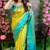 Elegant traditional saree look with floral backdrop