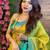 Elegant traditional saree look with floral backdrop