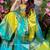 Elegant traditional saree look with floral backdrop