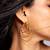 Layered high gold multi-hoop earrings