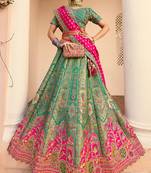 rama green banarasi silk woven zarkan cut work embroidered lehenga choli