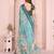 Sea green soft linen cotton printed silk saree with woven border