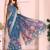 Teal soft linen cotton printed silk saree with woven border