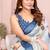 White soft linen cotton printed silk saree with woven border