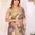 Beige chanderi cotton printed saree with zari woven border