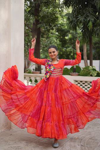 Pink faux georgette printed with kutchi patche work navratri flared gown