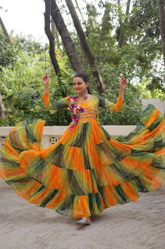 Yellow faux georgette printed with kutchi patche work navratri flared gown