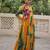 Yellow faux georgette printed with kutchi patche work navratri flared gown