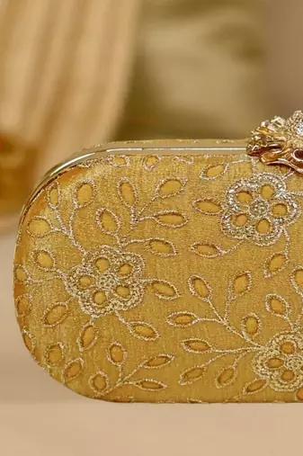 Yellow floral embroidered clutch