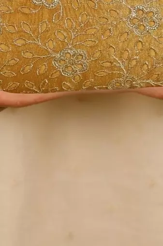 Yellow floral embroidered clutch