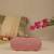 Pink floral embroidered clutch