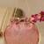 Pink floral embroidered potli bag