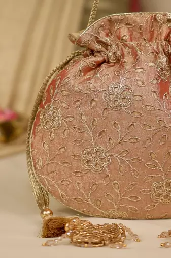 Red floral embroidered potli bag