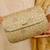 Gold floral embroidered clutch