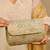 Gold floral embroidered clutch