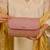Pink floral embroidered clutch