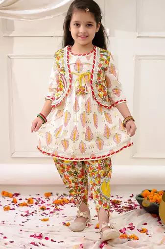 Yellow printed cotton kurti dhoti with jacket set for girls