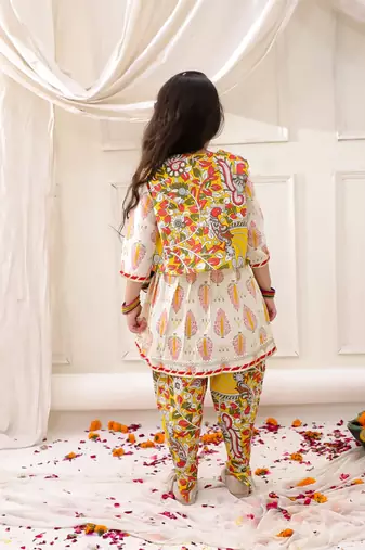 Yellow printed cotton kurti dhoti with jacket set for girls