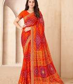 Orange bandhani work chiffon saree with border detailing and unstitched blouse