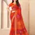 Orange bandhani work chiffon saree with border detailing and unstitched blouse