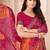 Magenta bandhani work chiffon saree with border detailing and unstitched blouse