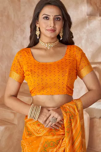 Mustard yellow bandhani printed chiffon saree with unstitched blouse