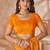 Mustard yellow bandhani printed chiffon saree with unstitched blouse