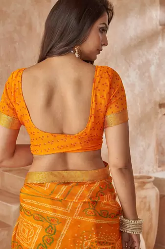 Mustard yellow bandhani printed chiffon saree with unstitched blouse