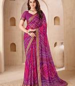 Purple & magenta bandhani work chiffon saree with border detailing and unstitched blouse