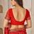 Red & orange bandhani work chiffon saree with border detailing and unstitched blouse