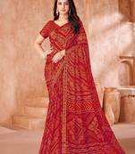 Red bandhani printed chiffon saree with unstitched blouse