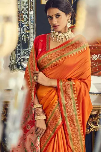 Orange soft silk party wear designer saree