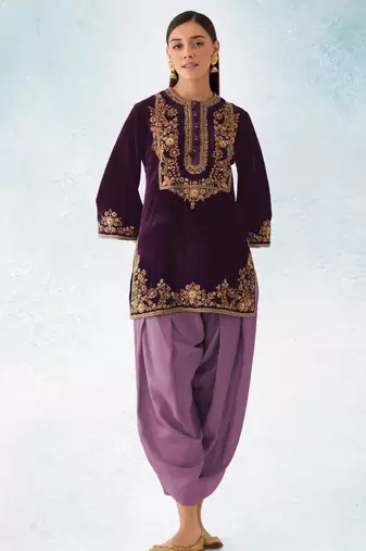 Purple embroidered velvet semi stitched patiyala suit