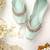 Mint green solid leather juttis
