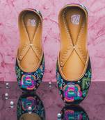 Black embroidered leather juttis