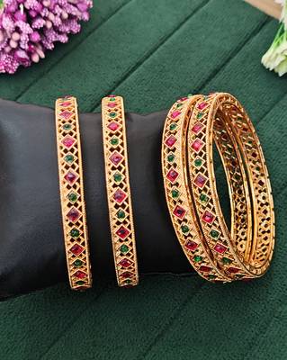 gold plated alloy bangles set with ruby green stones 1