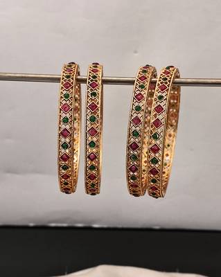 gold plated alloy bangles set with ruby green stones 3