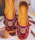 Maroon embroidered leather juttis