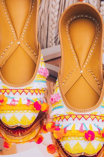 Multicolor embroidered leather juttis